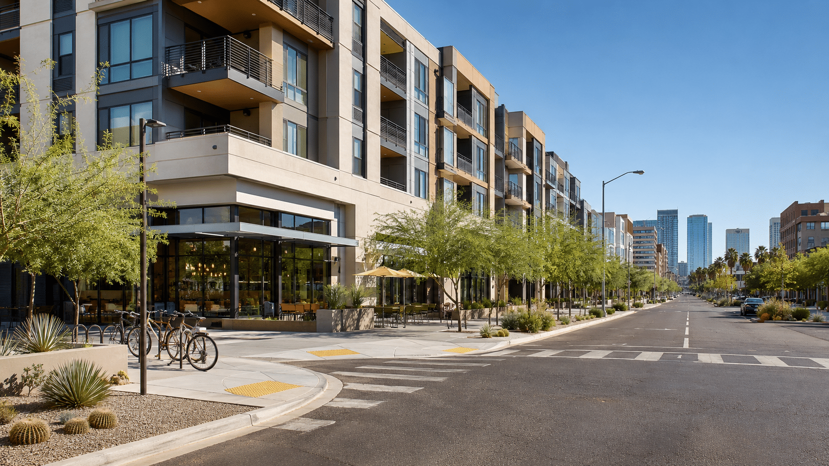 Phoenix Real Estate along Central Avenue with downtown condos, mid-rise buildings, and walkable urban streetscap